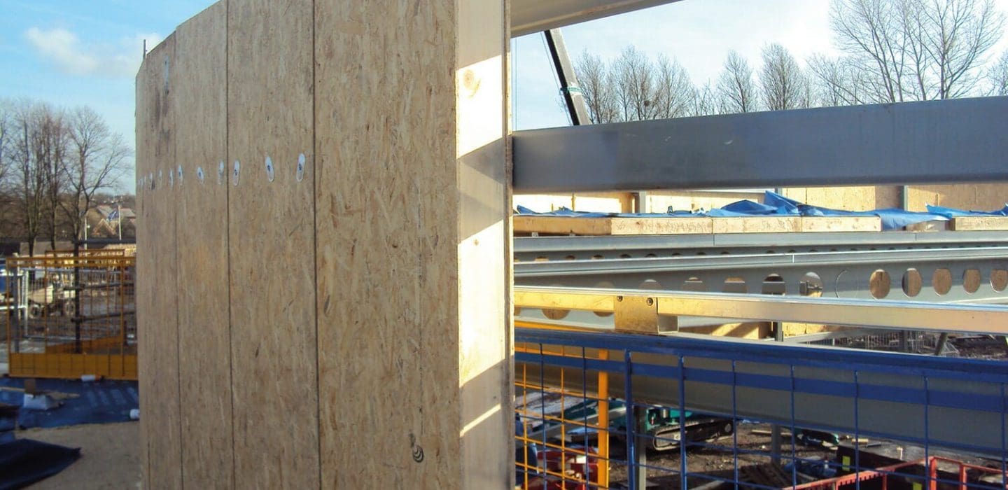 Sip panels being erected onto a structure